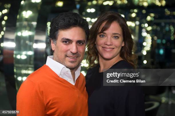 Shan Rahimkhan and Muriel Baumeister pose during a shoot for AMREF in Salon Shan Rahimkhan on December 16, 2013 in Berlin, Germany.