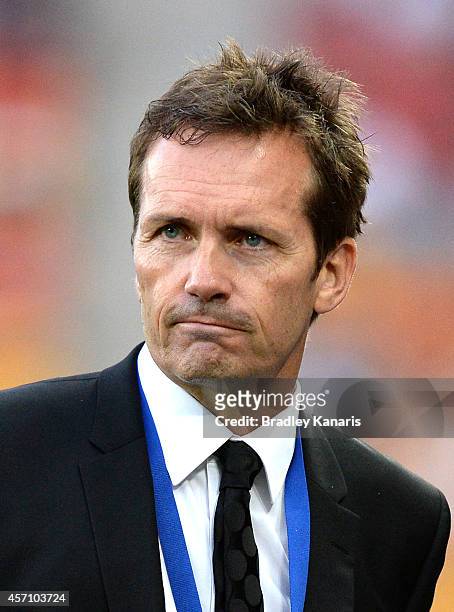 Coach Mike Mulvey of the Roar watches on during the round one A-League match between the Brisbane Roar and Adelaide United at Suncorp Stadium on...