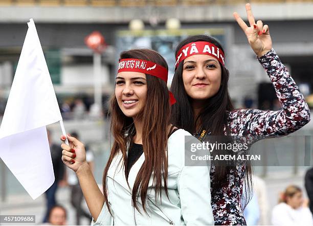 Turkey's Alawites women take part in a gathering on October 12 in Ankara, to protest against the government's anti-secular education policy and to...