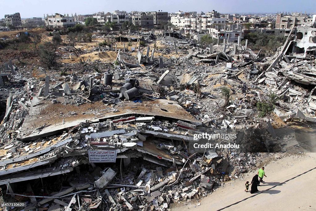 Palestinians live in the ruins of a destroyed Gaza's Shujaya neighborhood