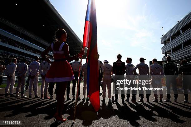 The drivers observe a short silence for Jules Bianchi of France and Marussia following his accident at Suzuka during the Russian Formula One Grand...