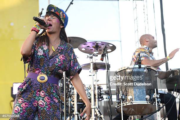 Singer Li Saumet and drummer Enrique "Kike" Egurrola of Bomba Estereo perform onstage during the Supersonico Festival at The Shrine Auditorium on...
