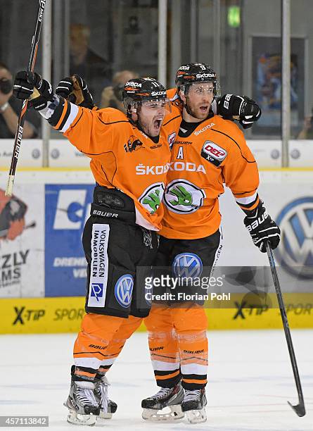 Brent Aubin and Jeff Likens of Grizzly Adams Wolfsburg celebrate after scoring the 4:3 goal during the DEL game between EHC Wolfsburg and Eisbaeren...