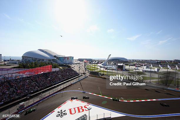 Drivers make their way round turn two during the Russian Formula One Grand Prix at Sochi Autodrom on October 12, 2014 in Sochi, Russia.