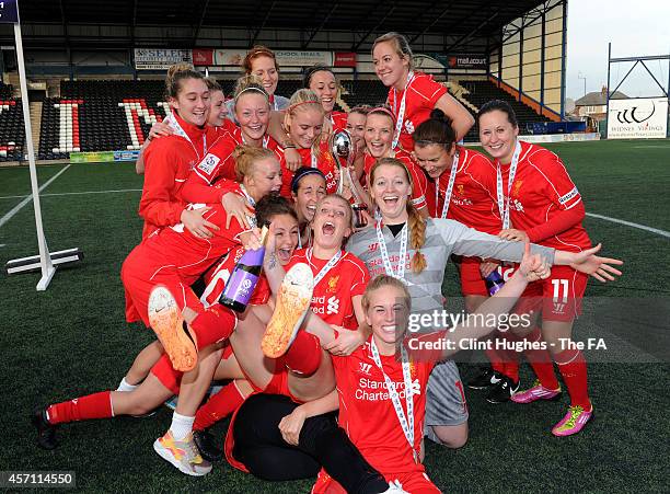 The Liverpool Ladies team celebrate with the WSL trophy up after their victory during the FA WSL 1 match between Liverpool Ladies FC and Bristol...