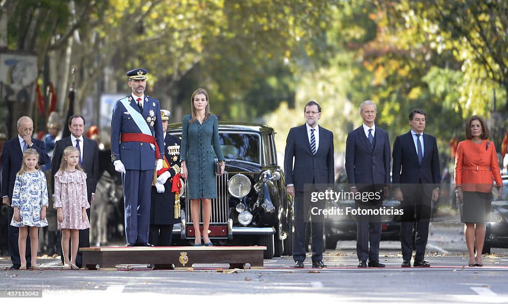 Spanish Royals Attend National Day Military Parade 2014