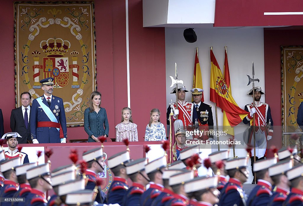 Spanish Royals Attend National Day Military Parade 2014