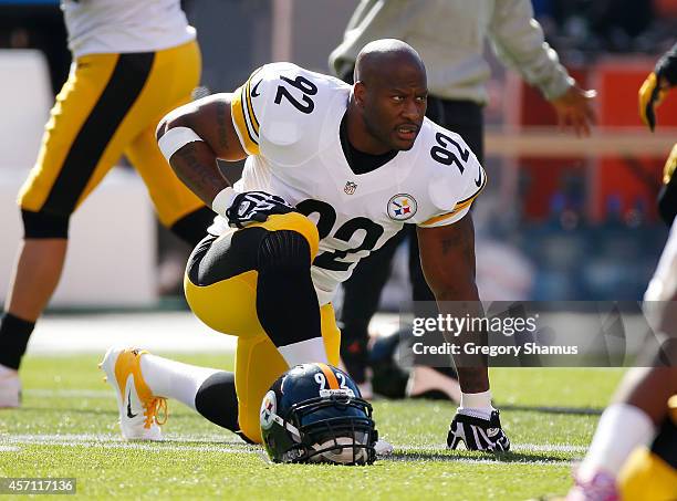 James Harrison of the Pittsburgh Steelers warms up prior to the game against the Cleveland Browns at FirstEnergy Stadium on October 12, 2014 in...