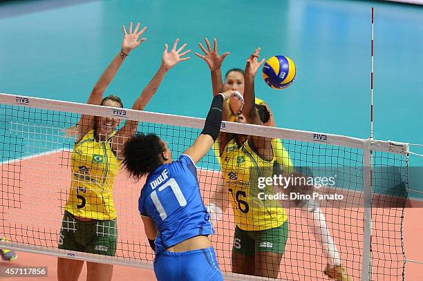 Valentina Diouf of Italy spikes the ball against to Thaisa Menezes and Fernanda Rodrigues during the FIVB Women's World Championship 3rd Place...