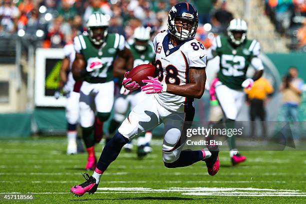 Demaryius Thomas of the Denver Broncos runs the ball in the first quarter during a game against the New York Jets at MetLife Stadium on October 12,...