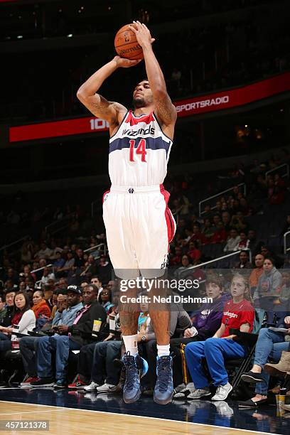 Glen Rice Jr. #14 of the Washington Wizards shoots the ball against the Detroit Pistons during the game on October 12, 2014 at Verizon Center in...