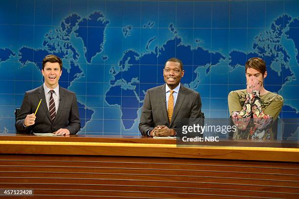 Bill Hader" Episode 1665 -- Pictured: Colin Jost, Michael Che and Bill Hader as Stefon during Weekend Update on October 11, 2014 --