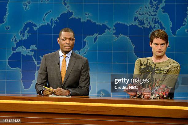 Bill Hader" Episode 1665 -- Pictured: Michael Che and Bill Hader as Stefon during Weekend Update on October 11, 2014 --