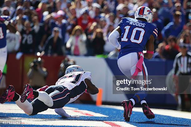 Robert Woods of the Buffalo Bills makes a touchdown catch past Alfonzo Dennard of the New England Patriots during the first half at Ralph Wilson...