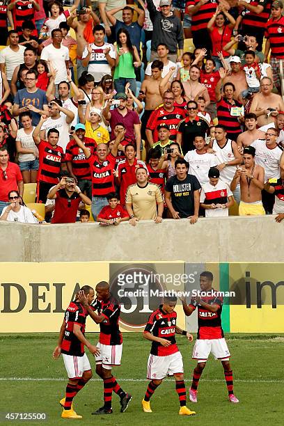 Alecsandro of Flamengo is congratulated by Marcelo after scoring a goal against Cruzeiro during a match between Flamengo and Cruzeiro as part of...