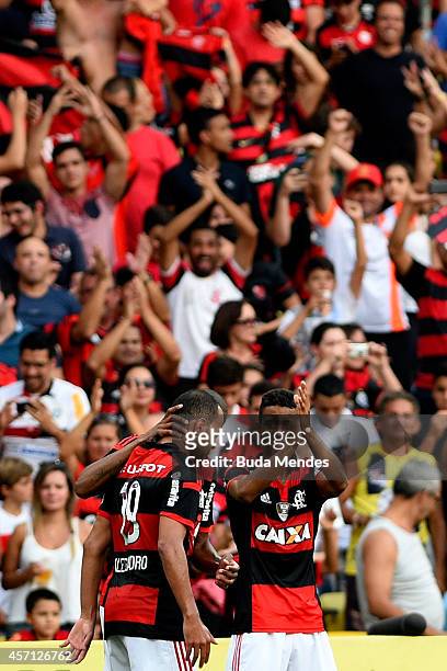 Players of Flamengo celebrates a scored goal against Cruzeiro during a match between Flamengo and Cruzeiro as part of Brasileirao Series A 2014 at...