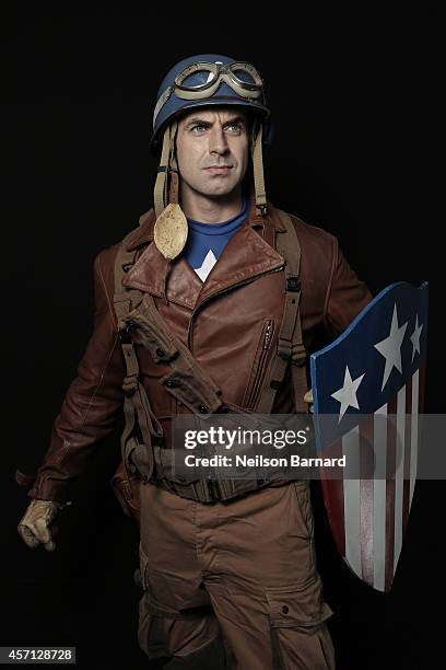 Comic Con attendee Dan Scanlon poses as Captain America from The First Avenger during the 2014 New York Comic Con at Jacob Javits Center on October...