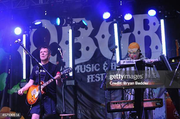 Members of the band Devo Bob Mothersbaugh and Mark Mothersbaugh perform during CBGB Music & Film Festival 2014 - Times Square Concerts on October 12,...