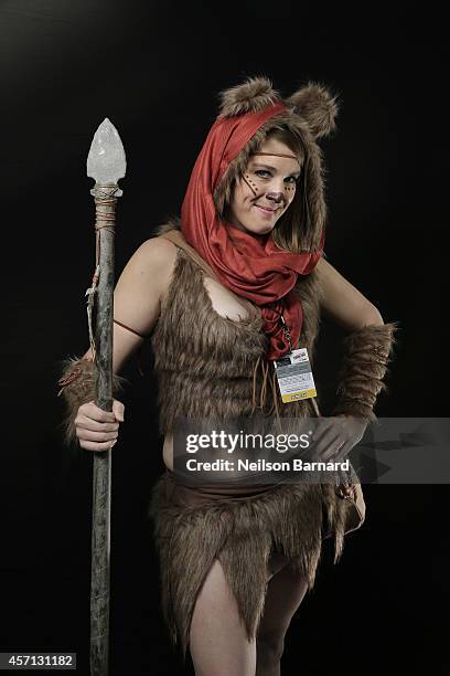 Comic Con attendee Kate Rielly poses as Wicket from Return of the Jedi during the 2014 New York Comic Con at Jacob Javitz Center on October 12, 2014...