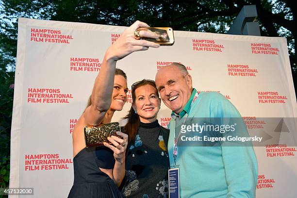 Hilary Swank, Judith Nathan and Rudy Giuliani attend 'The Homesman' premiere during the 2014 Hamptons International Film Festival on October 12, 2014...