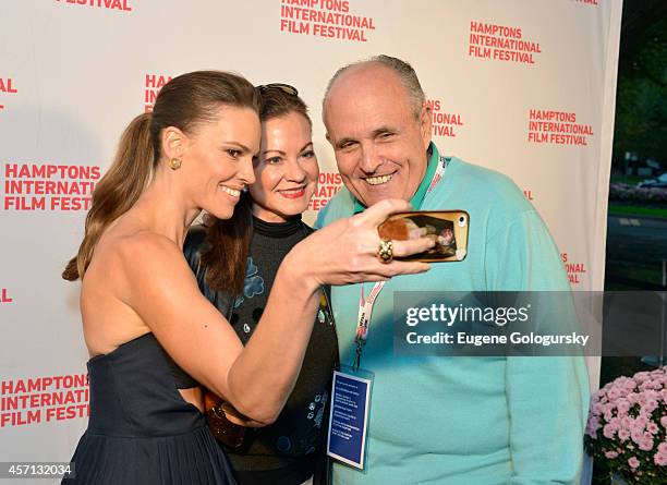 Hilary Swank, Judith Nathan and Rudy Giuliani attend 'The Homesman' premiere during the 2014 Hamptons International Film Festival on October 12, 2014...