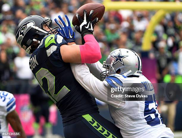 Outside linebacker Kyle Wilber of the Dallas Cowboys breaks up a pass intended for tight end Luke Willson of the Seattle Seahawks during the fourth...