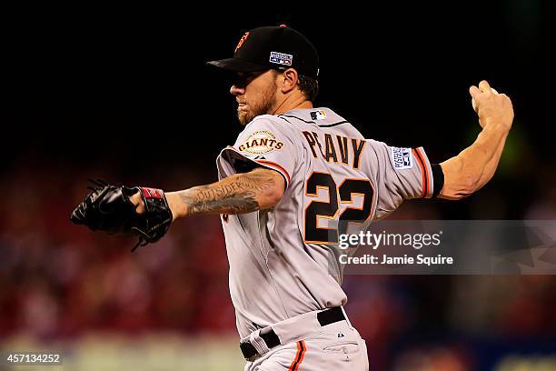 Jake Peavy of the San Francisco Giants pitches in the first inning against the St. Louis Cardinals during Game Two of the National League...