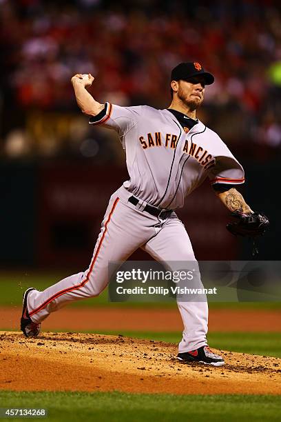 Jake Peavy of the San Francisco Giants pitches in the first inning against the St. Louis Cardinals during Game Two of the National League...