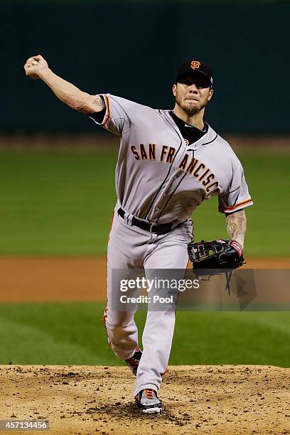 Jake Peavy of the San Francisco Giants pitches in the first inning against the St. Louis Cardinals during Game Two of the National League...