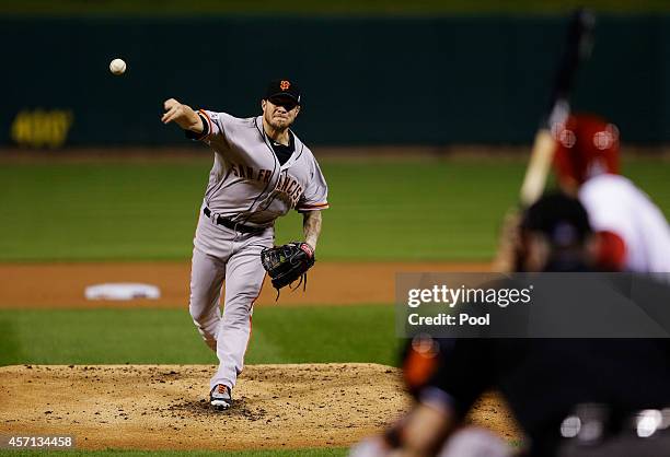 Jake Peavy of the San Francisco Giants pitches in the first inning against the St. Louis Cardinals during Game Two of the National League...