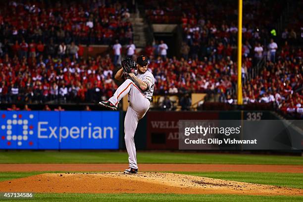 Jake Peavy of the San Francisco Giants pitches in the first inning against the St. Louis Cardinals during Game Two of the National League...