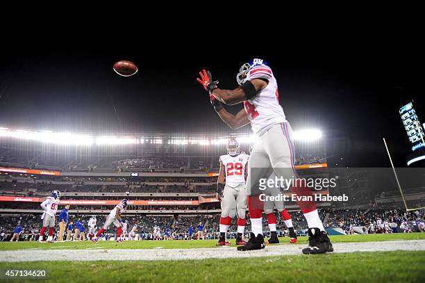 Running back Andre Williams of the New York Giants warms up prior to a football game against the Philadelphia Eagles at Lincoln Financial Field on...
