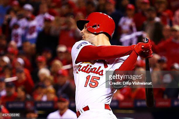 Randal Grichuk of the St. Louis Cardinals hits an RBI single scoring Matt Adams in the fourth inning against the San Francisco Giants during Game Two...