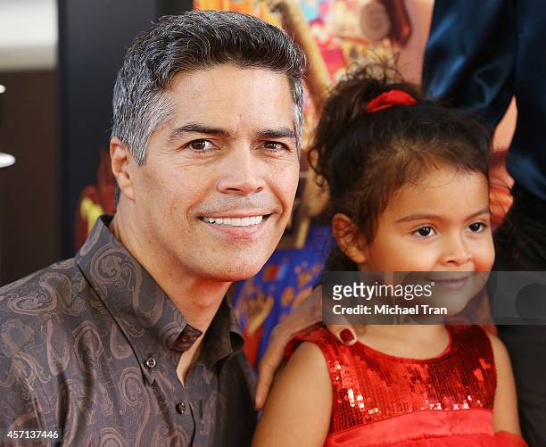 Esai Morales and daughter Mariana Oliveira Morales arrive at the Los Angeles premiere of "Book Of Life" held at Regal Cinemas L.A. Live on October...