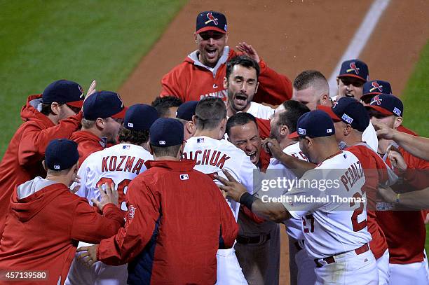 Kolten Wong of the St. Louis Cardinals celebrates his solo home run in the ninth inning to give the St. Louis Cardinals the 5 to 4 win over the San...