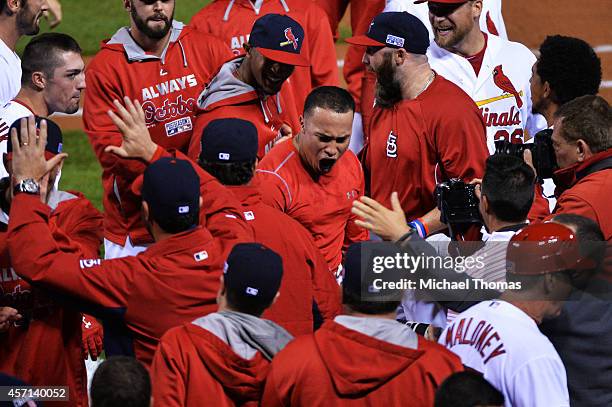 Kolten Wong of the St. Louis Cardinals celebrates his solo home run in the ninth inning to give the St. Louis Cardinals the 5 to 4 win over the San...