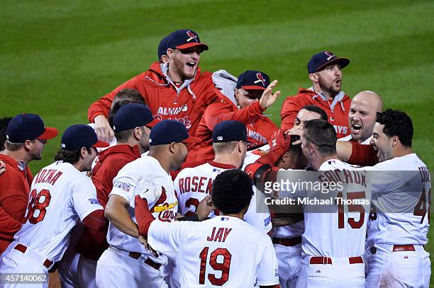 Kolten Wong of the St. Louis Cardinals celebrates his solo home run in the ninth inning to give the St. Louis Cardinals the 5 to 4 win over the San...
