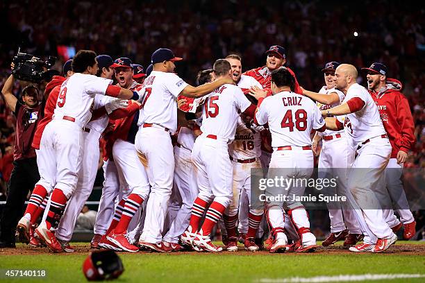 Kolten Wong of the St. Louis Cardinals celebrates his solo home run in the ninth inning to give the St. Louis Cardinals the 5 to 4 win over the San...