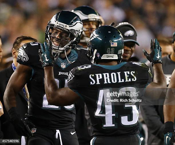 Darren Sproles of the Philadelphia Eagles celebrates with teammate LeSean McCoy after scoring a touchdown against the New York Giants during the...