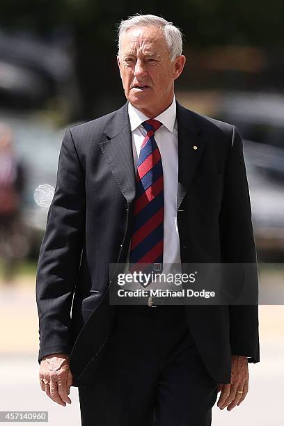 Former Demons player Stan Alves arrives during a memorial service held for former Melbourne Demons VFL player Robert Flower at Melbourne Cricket...