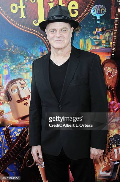 Composer Gustavo Santaolalla arrives for the Premiere Of Twentieth Century Fox And Reel FX Animation Studios' "The Book Of Life" held at Regal...