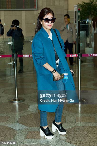 Soyeon of South Korean girl group T-ara is seen on departure at Gimpo International Airport on October 13, 2014 in Seoul, South Korea.