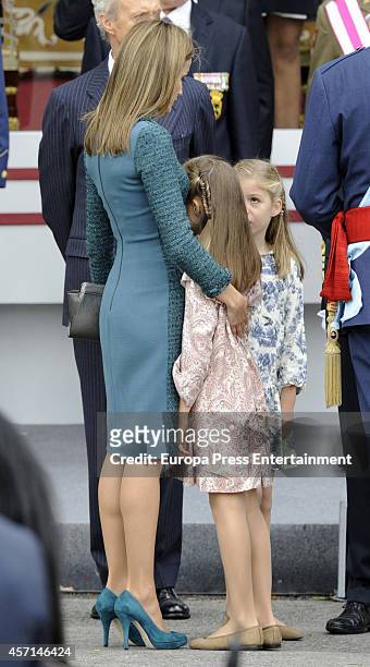 Queen Letizia of Spain, Princess Leonor and Princess Sofia attend the National Day Military Parade on October 12, 2014 in Madrid, Spain.