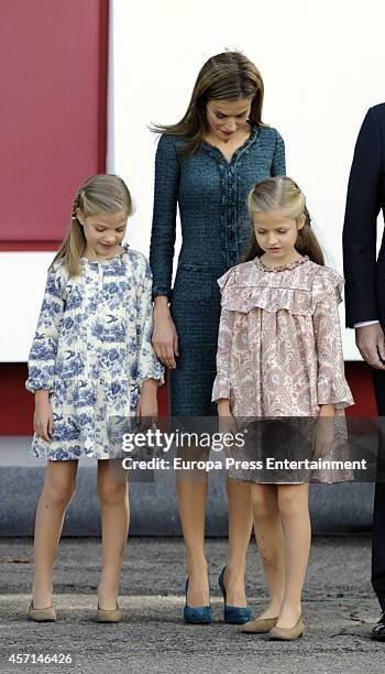 Queen Letizia of Spain, Princess Leonor and Princess Sofia attend the National Day Military Parade on October 12, 2014 in Madrid, Spain.