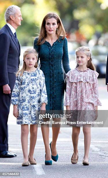 Queen Letizia of Spain, Princess Leonor and Princess Sofia attend the National Day Military Parade on October 12, 2014 in Madrid, Spain.