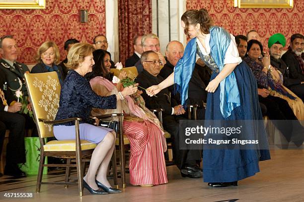 Queen Sonja of Norway attends a guided tour at the Oslo City Hall during the first day of the state visit from India on October 13, 2014 in Oslo,...