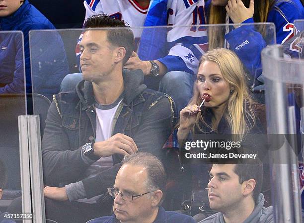 Adam Cobb and AnnaSophia Robb attend New York Rangers vs Toronto Maple Leafs game at Madison Square Garden on October 12, 2014 in New York City.