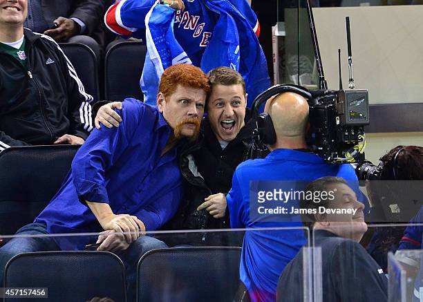 Michael Cudlitz and Ben McKenzie attend New York Rangers vs Toronto Maple Leafs game at Madison Square Garden on October 12, 2014 in New York City.