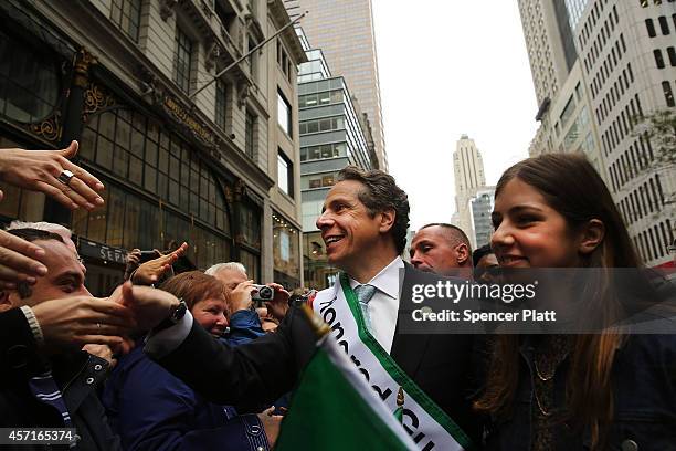 New York Gov. Andrew Cuomo marches in the annual Columbus Day parade with his daughter Michaela on October 13, 2014 in New York City. Organized by...