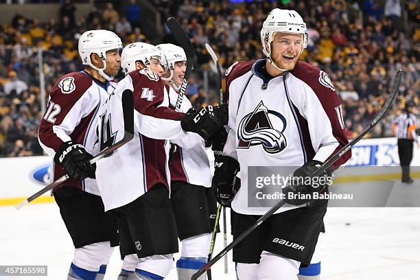 Jamie McGinn of the Colorado Avalanche celebrates a goal with his teammates against the Boston Bruins at the TD Garden on October 13, 2014 in Boston,...